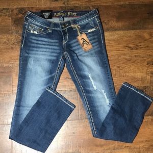 Antique Rivet Jeans with design on pockets.